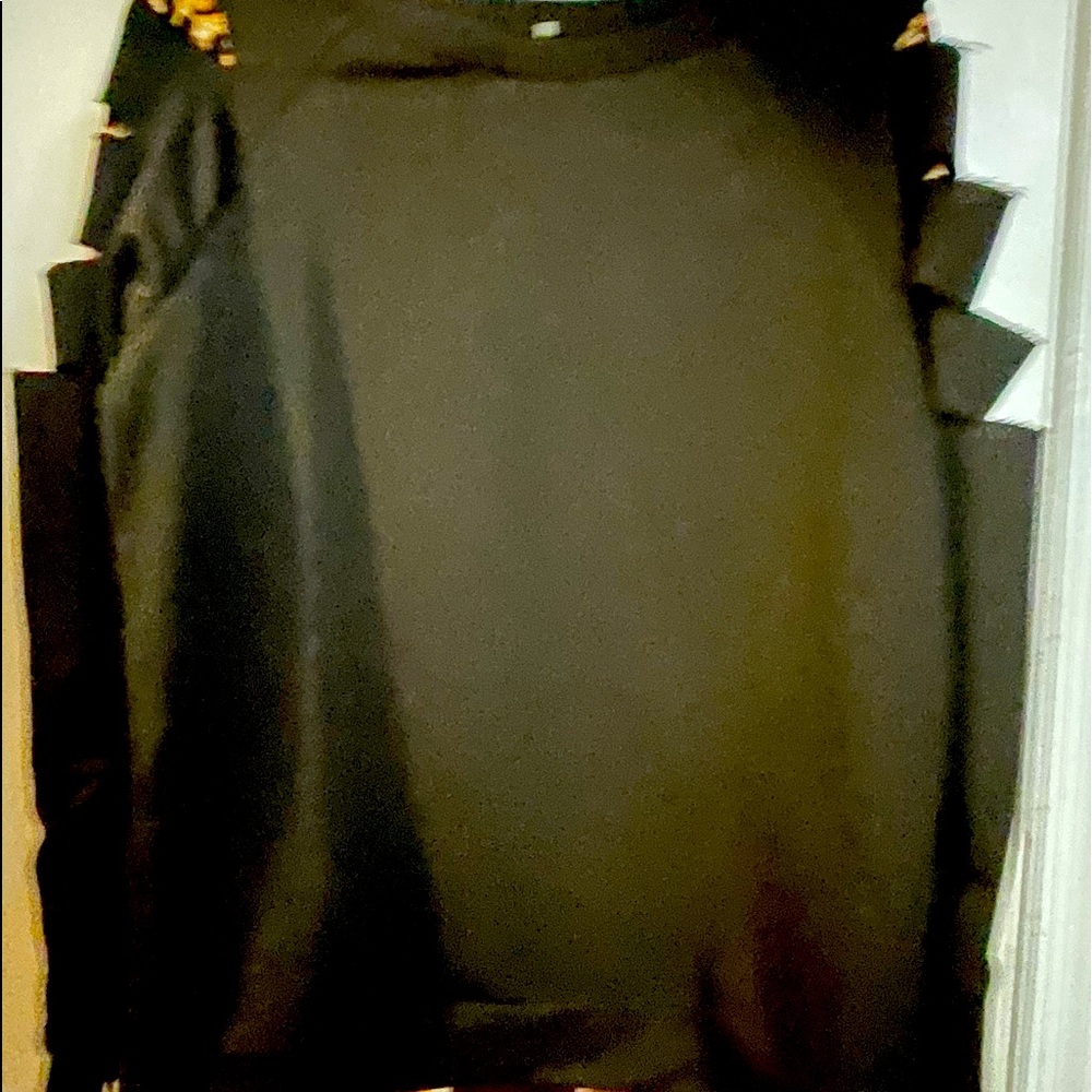 Black top with peek a boo leopard rips down arms